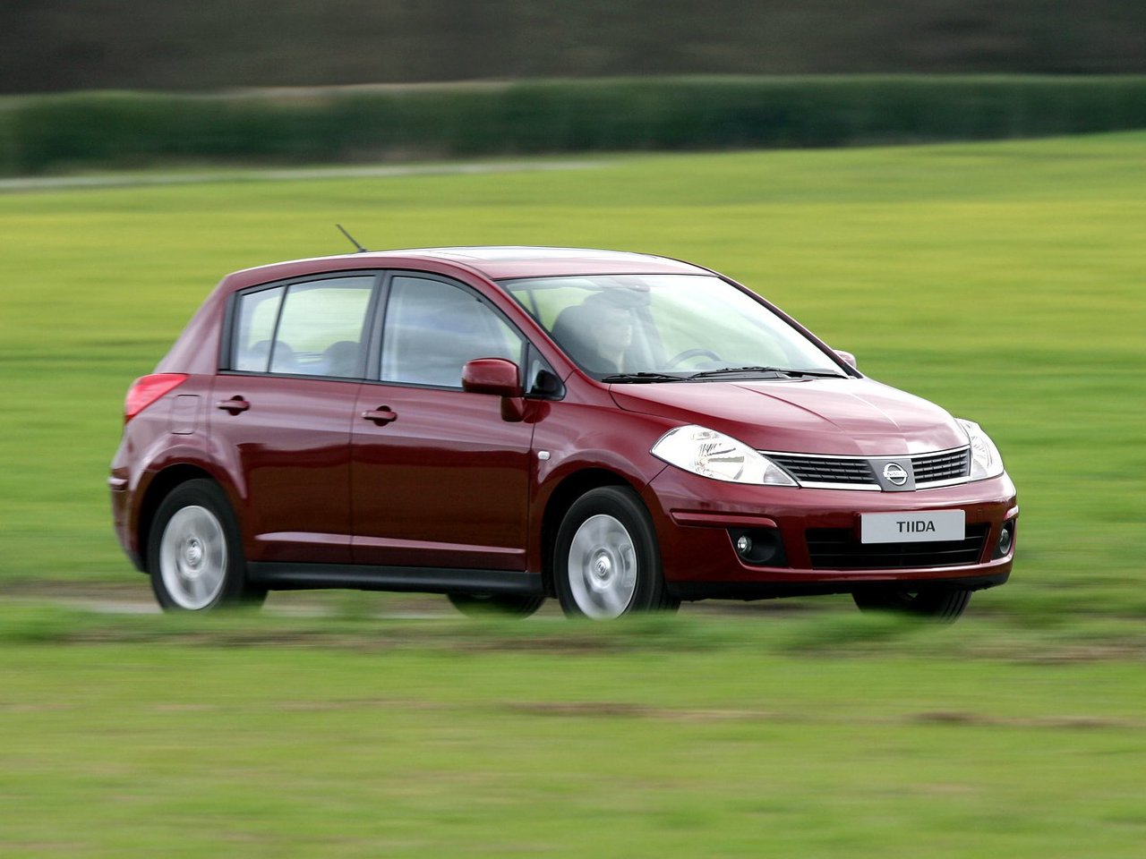 Nissan Tiida I Рестайлинг хэтчбек 5 дв., 2010–2013