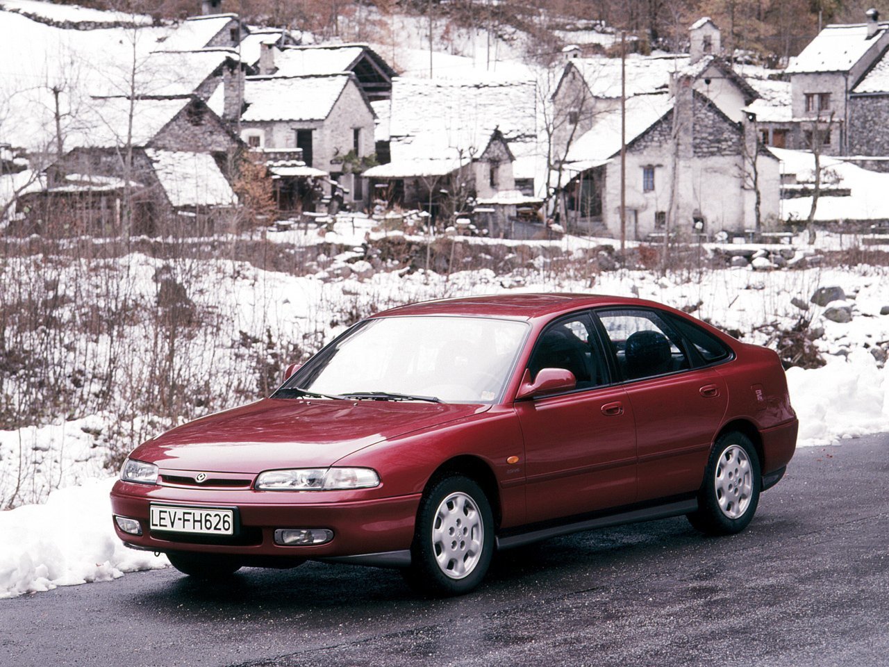 Mazda 626 IV (GE) лифтбек, 1991–1997