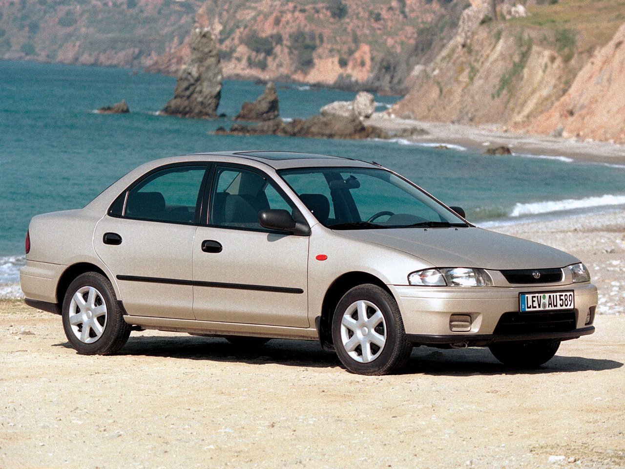 Mazda Familia VII (BH) седан, 1994–1999